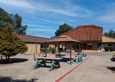 The courtyard with tables at Wagner Heights