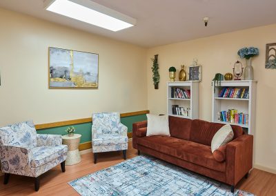 A room with couches and chairs at Wagner Heights